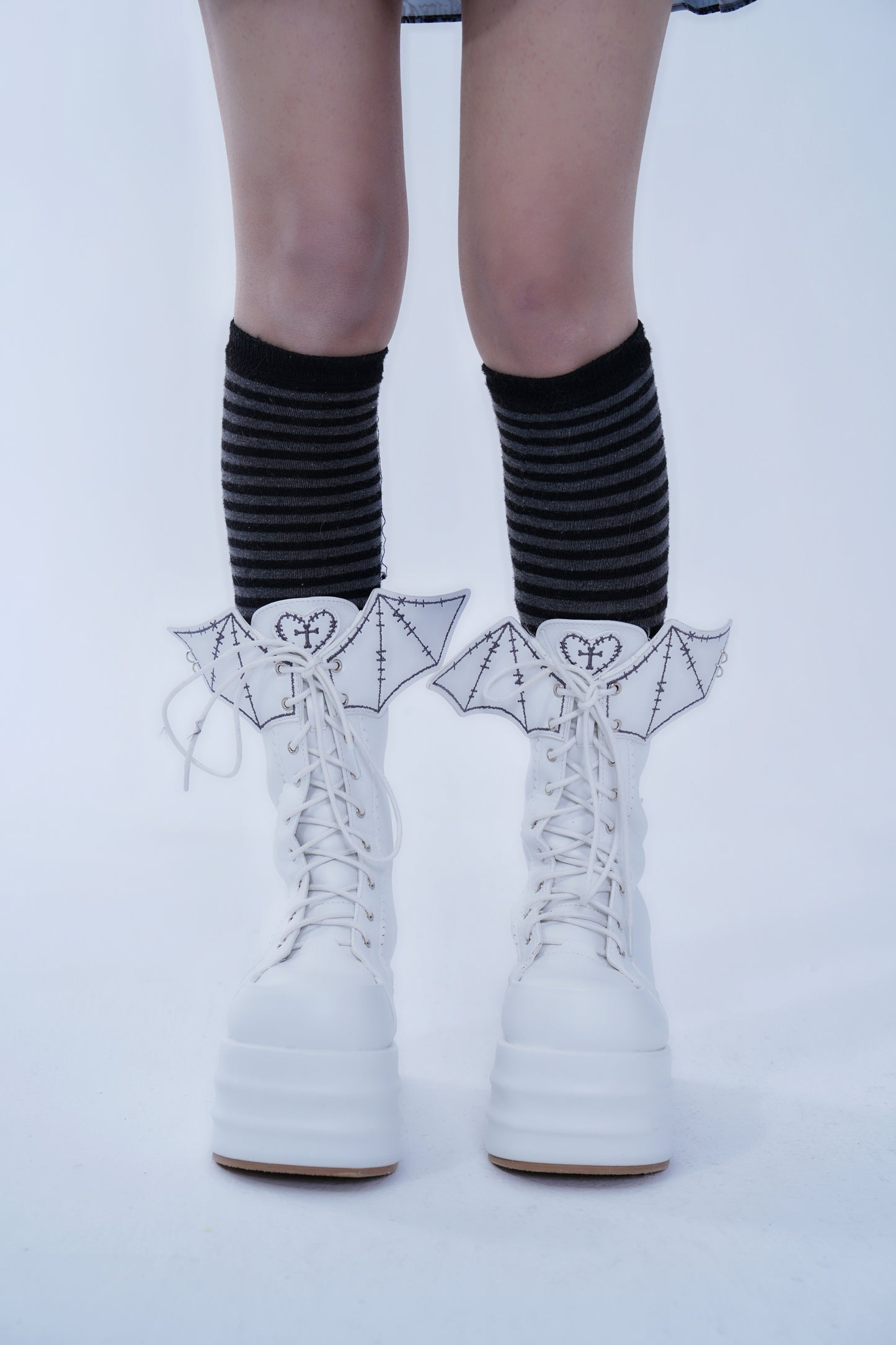 Bone-Eroding Demon Platform Boots